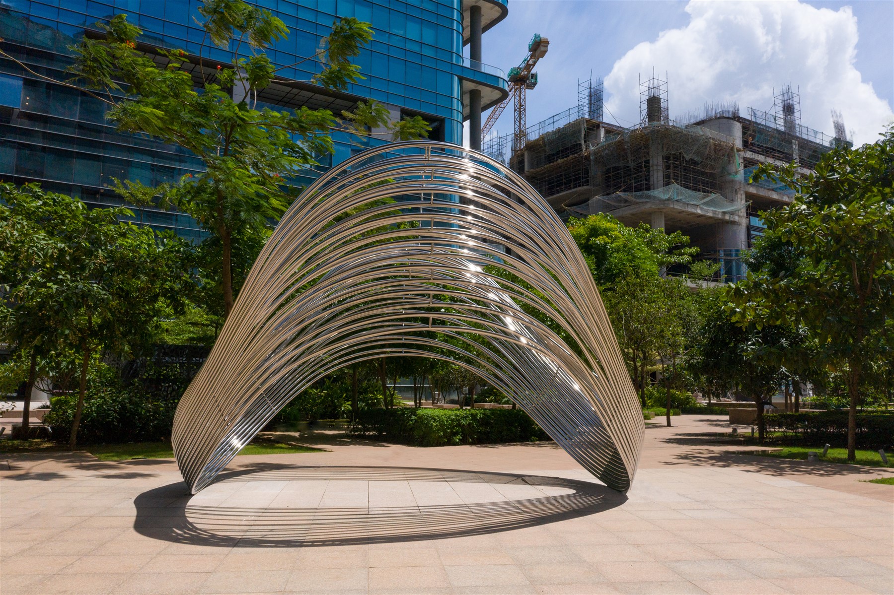 Billow Stainless Steel Sculpture In Garden